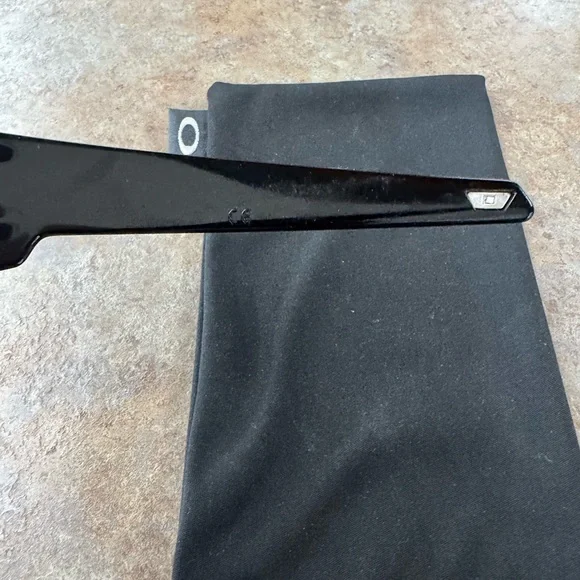 Oakley Wrap Sunglasses with Black Frame and Red-Orange Mirrored Lenses - Picture 6 of 11